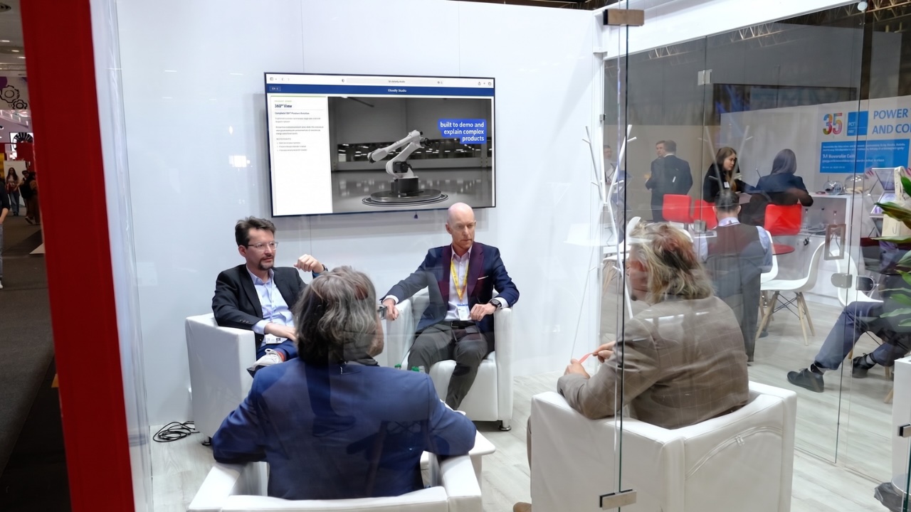 Cloudly Studio team engaging with visitors at Hannover Messe 2026